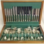 An Oak cased silver plated canteen of cutlery