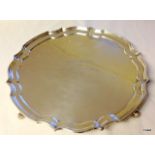 A solid silver salver, 25cm diameter, hallmarked Sheffield 1976, 530gms