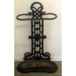 A cast iron umbrella stand 70cm high 40cm wide 14cm deep