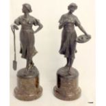 Pair of early C20th spelter figures of farm girls on serpentine marble bases.  29cm high.