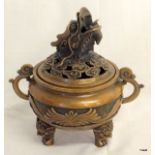 Chinese bronze incense burner with dragon head lid, and a four character mark to the underside.