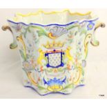 Large C19th French pottery jardinière with coat of arms and floral decoration.  20cm high