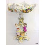 A Large Naples Porcelain centre piece 38cm high hand painted with a couple holding a flower garland