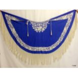 A Chinese silk blue and white embroidered shawl