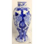 C19th Chinese blue and white vase with peony and foliate decoration.  26cm high
