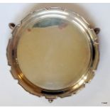 A silver card tray, hallmarked London 1936  maker EB, 176gms. 15cm diameter