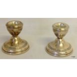 A pair of Silver Hallmarked dwarf candle sticks, 5.5cm tall