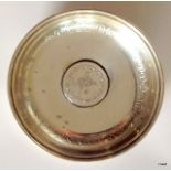 An Oriental silver coin pin tray, 34gms