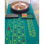 A full size professional John Huxley 'Single 0' Roulette wheel, complete with a full size uncut