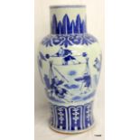 C19th blue and white vase with figures in continuous landscape.  40cm high.