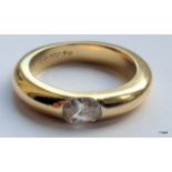 An 18ct gold and diamond mans solitaire ring size t