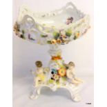 A small Naples porcelain centrepiece with cherub and flower decoration 20cm high