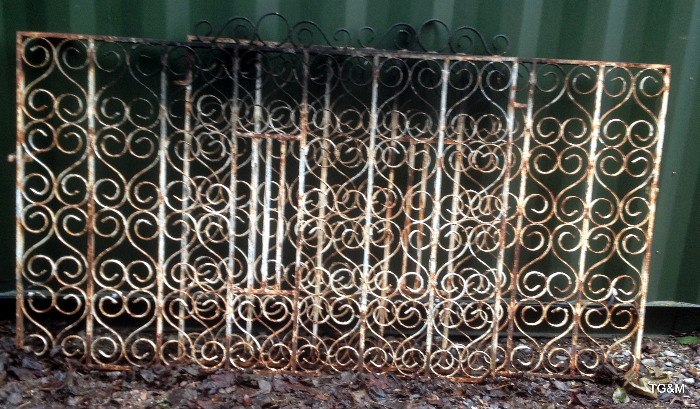 Pair of large metal drive gates