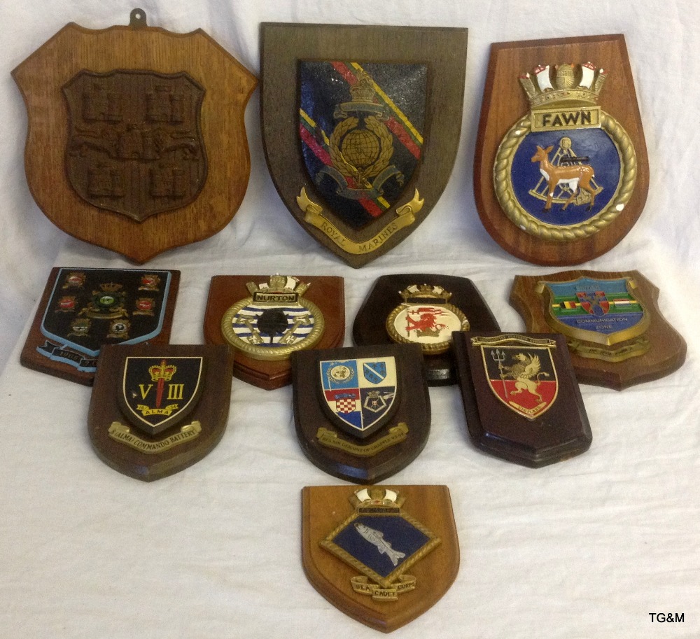 Ten military wall shields and plaques