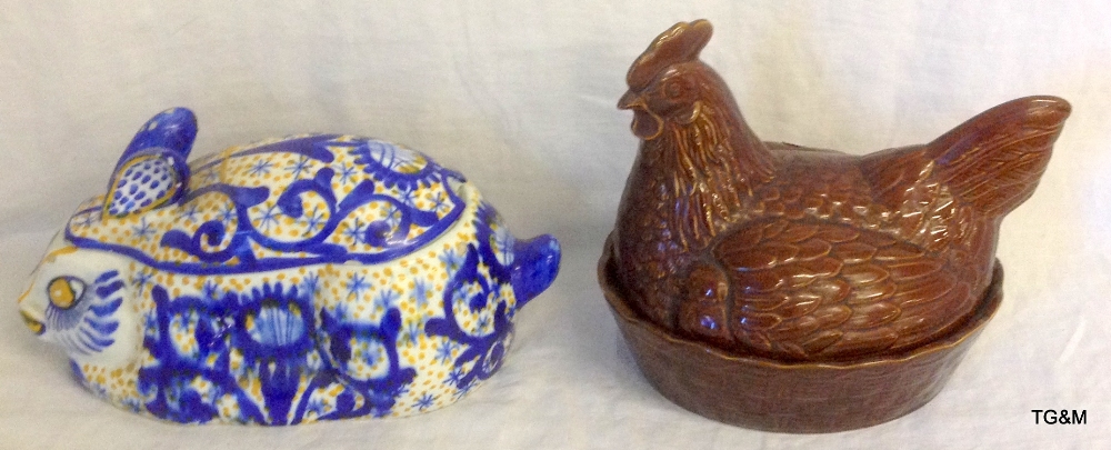 Glazed pottery egg holder in the form of a chicken and a blue and white tureen in the form of a