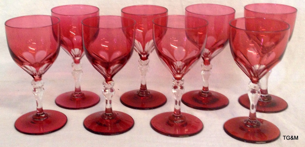 Eight cranberry wine glasses