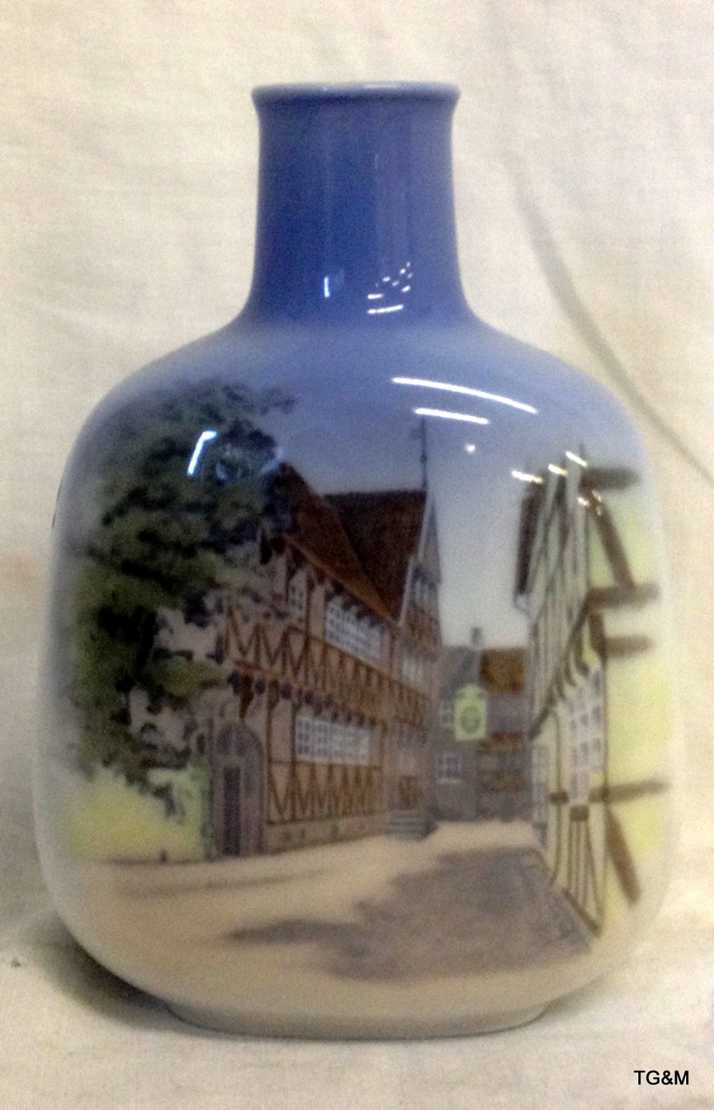 Royal Copenhagen bottle vase decorated with a street scene