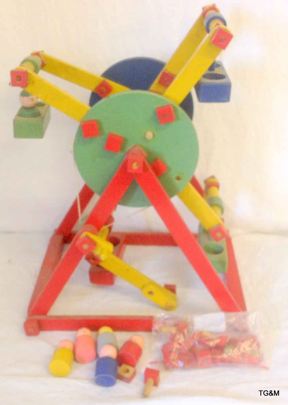 Wooden child`s big wheeler toy