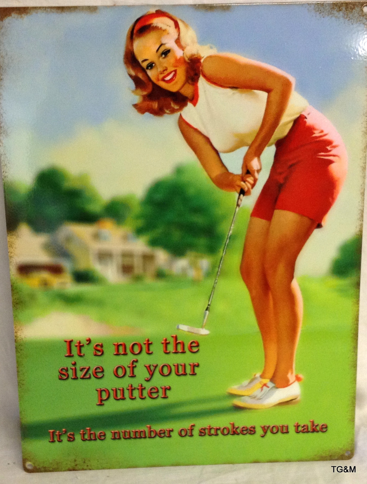 Metal advertising sign "not the size of your putter"