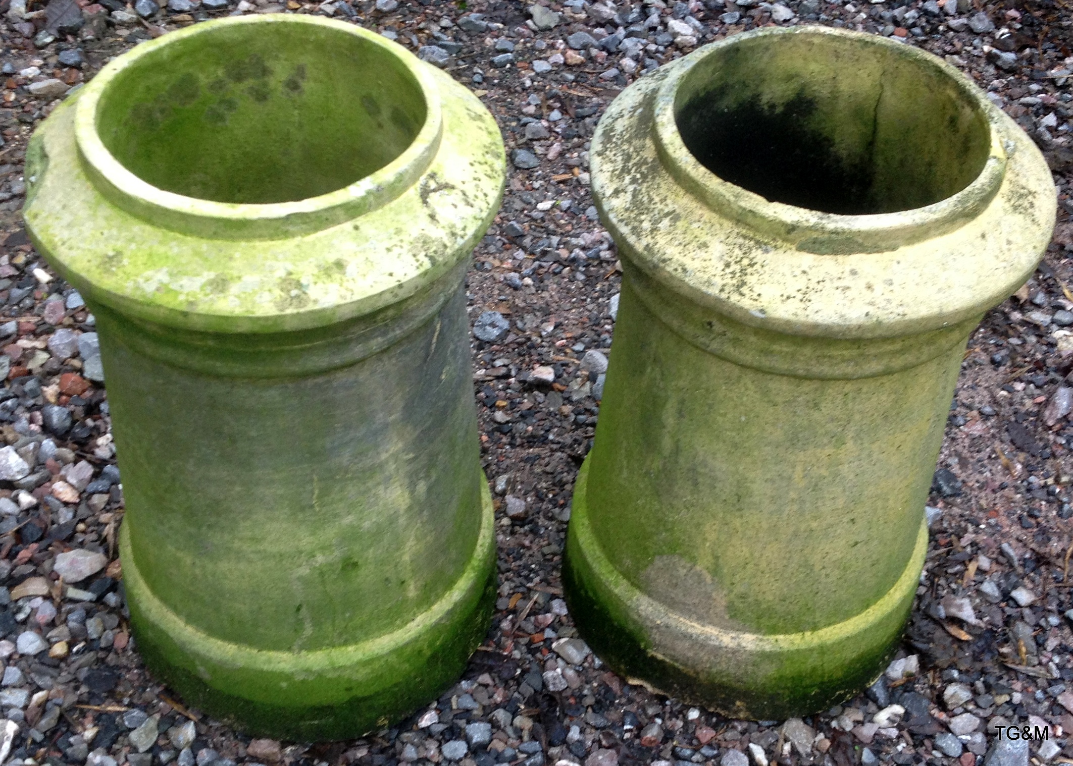 Pair of stone chimney pots