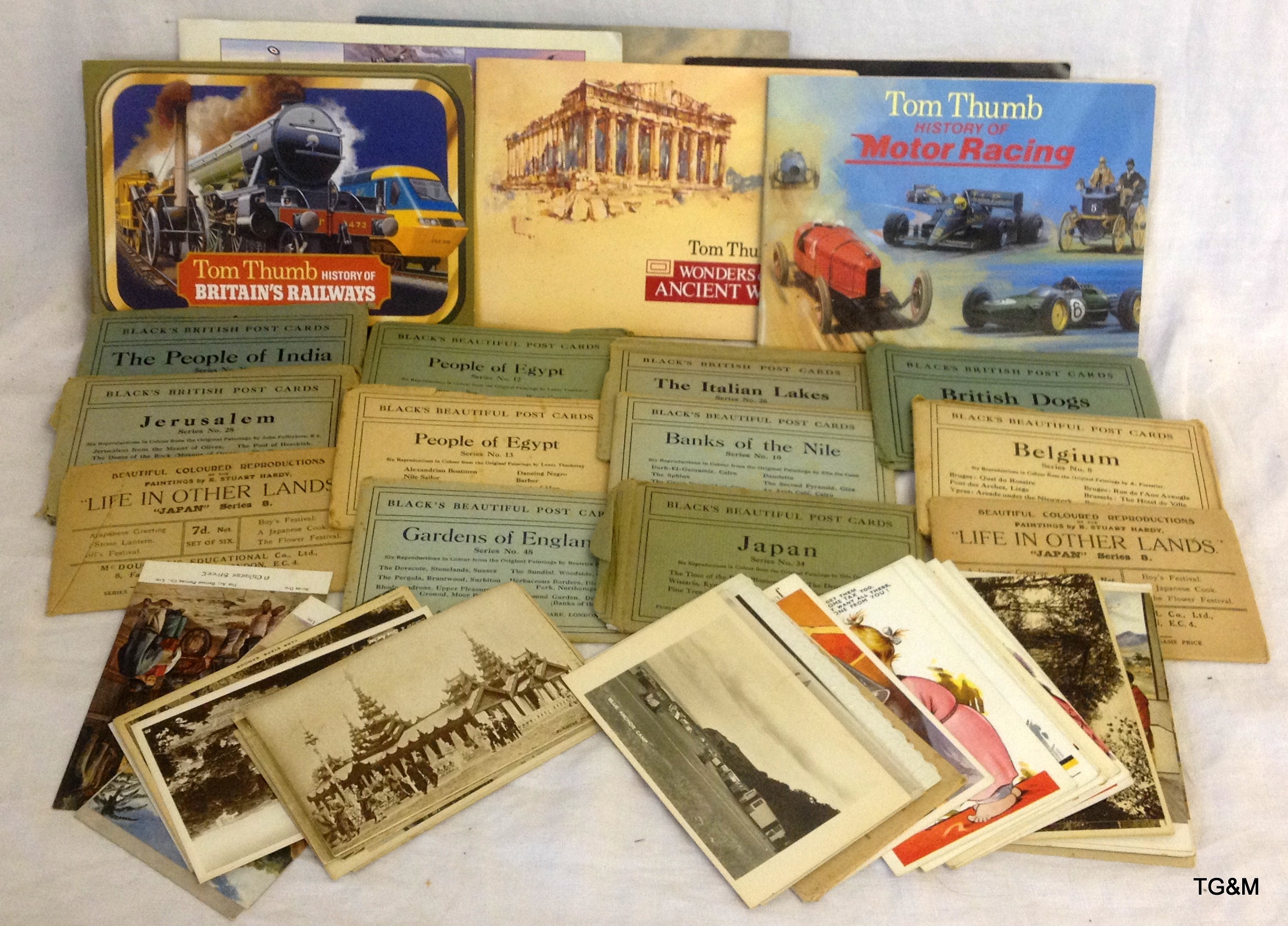 Collection of postcards and cigarette cards