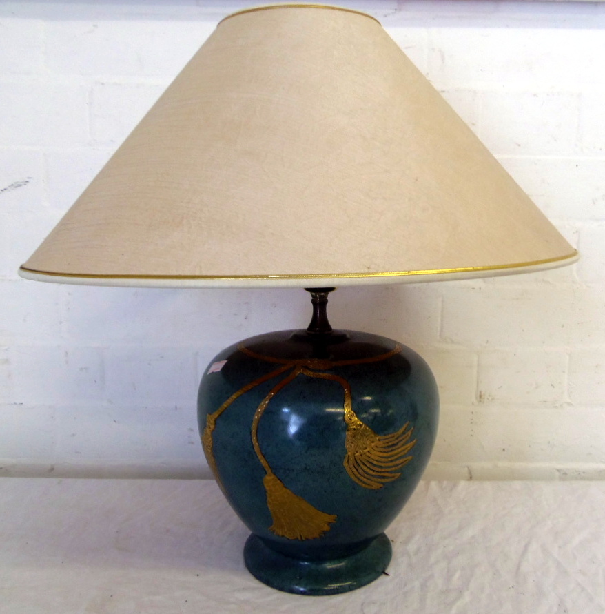 A pottery table lamp with gilded decoration