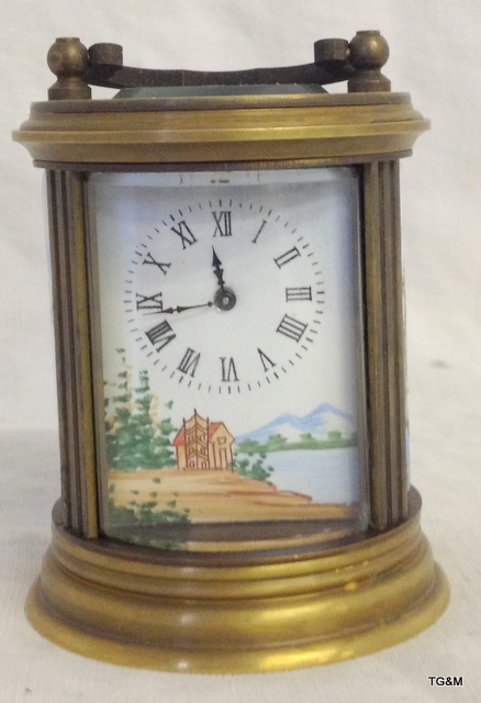 A round picture miniature carriage clock