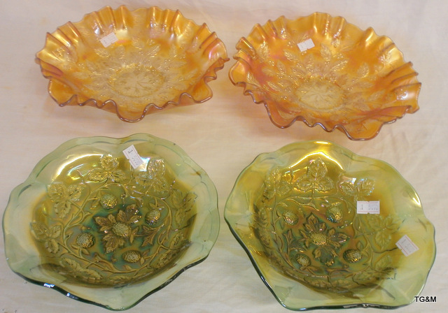 Four carnival glass bowls