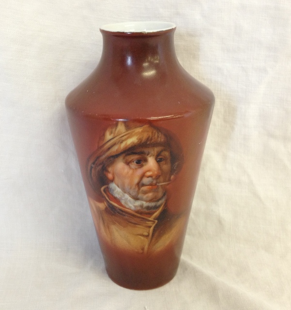 Small porcelain vase decorated with a fisherman