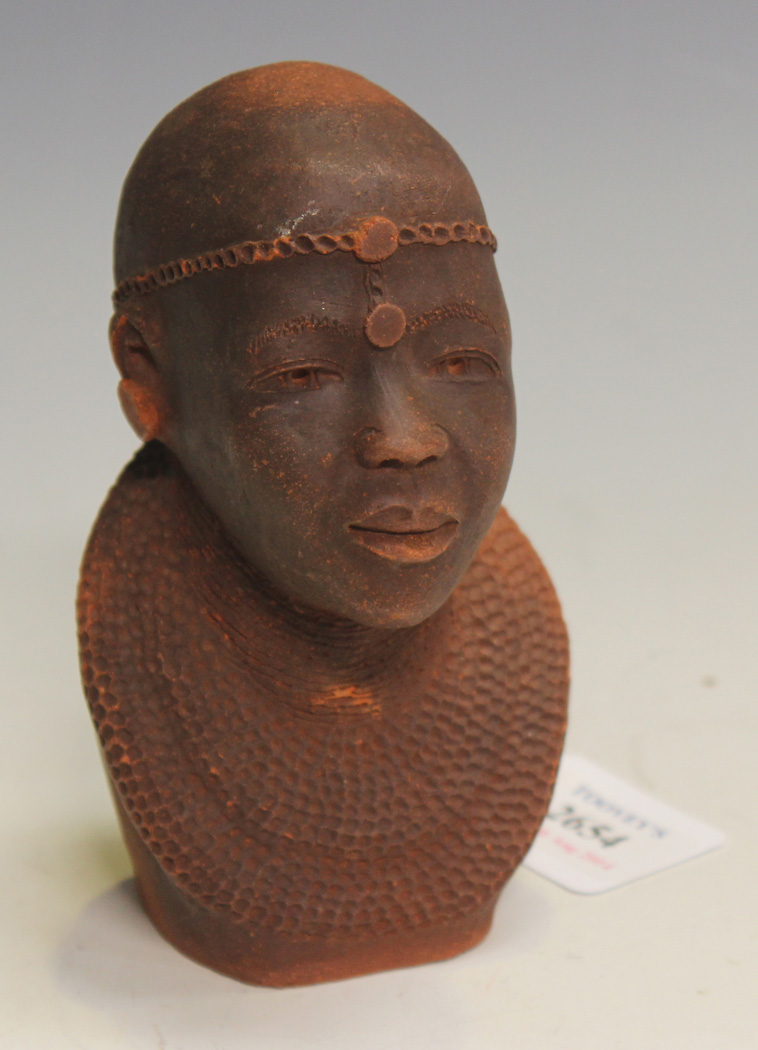 Tom - a late 20th Century terracotta model of an African woman`s head, inscribed verso, height