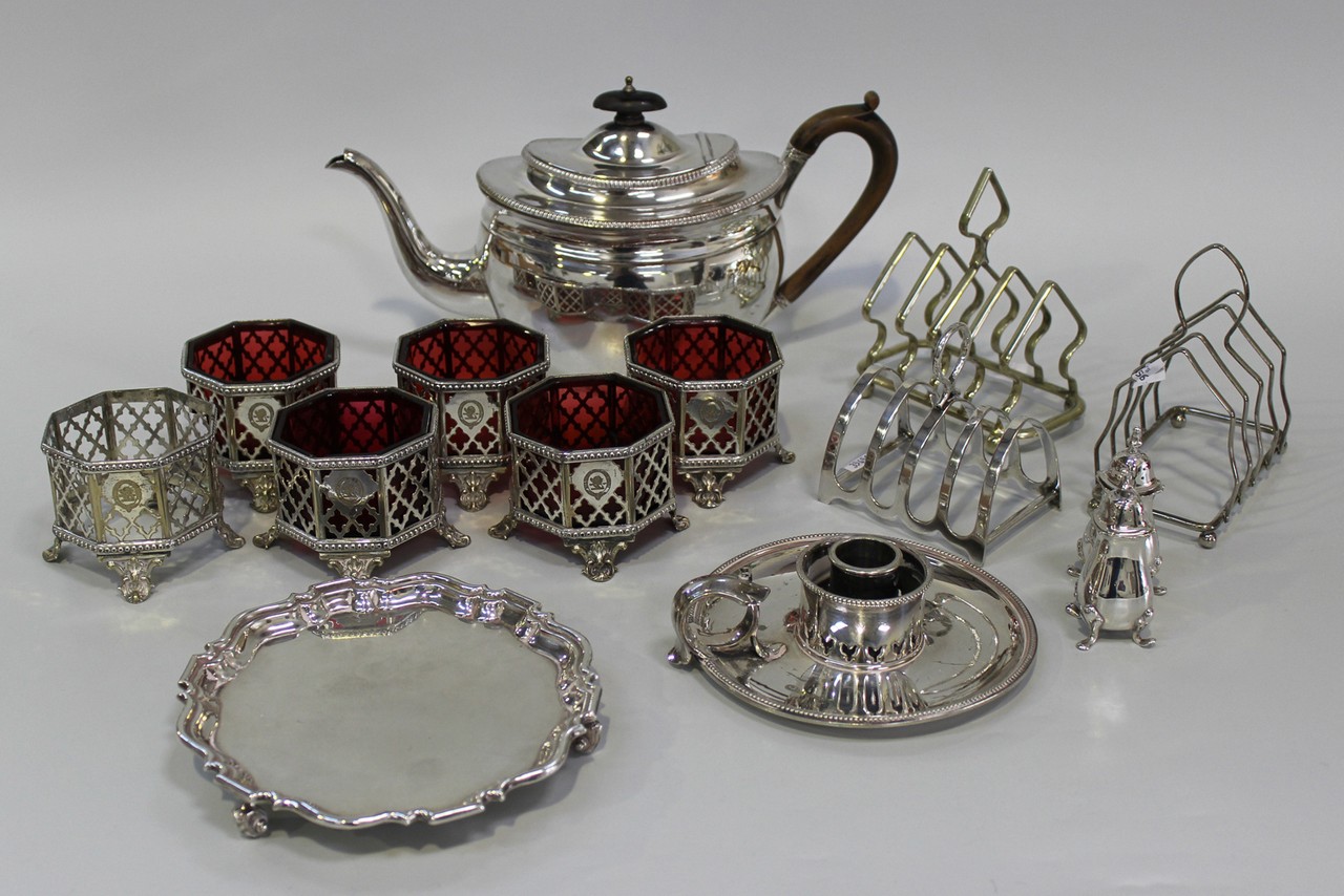 A set of six Victorian plated octagonal salts with pierced lattice decoration and beaded rims, on