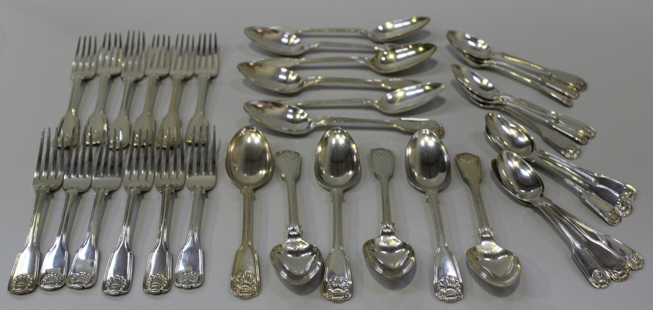 A set of six early Victorian silver Fiddle, Thread and Shell pattern dessert spoons, London 1839