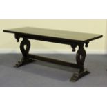 An 20th Century oak refectory table on lyre supports, united by a stretcher, length approx 184cm.