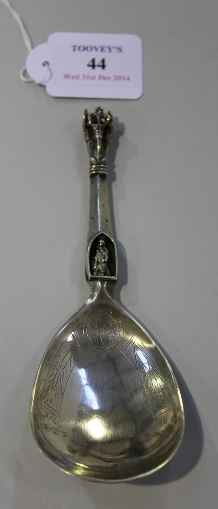 A late 19th Century Continental silver spoon, the terminal pierced with four sceptres above a