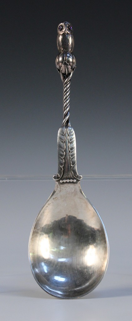 A Georg Jensen sterling silver serving spoon, shape number 39, the terminal formed as an owl with