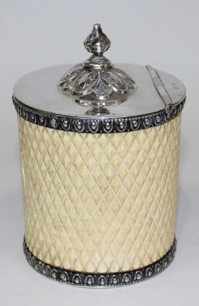 A mid-Victorian carved ivory and plate mounted tea caddy of oval section, the hinged lid with a - Image 2 of 4