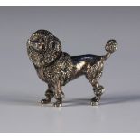 An Edwardian silver novelty pepper in the form of a poodle, London 1906 by William Edward Hurcomb,