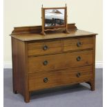 An Edwardian walnut chest of two short and two long drawers, on bracket feet, height approx 89cm,