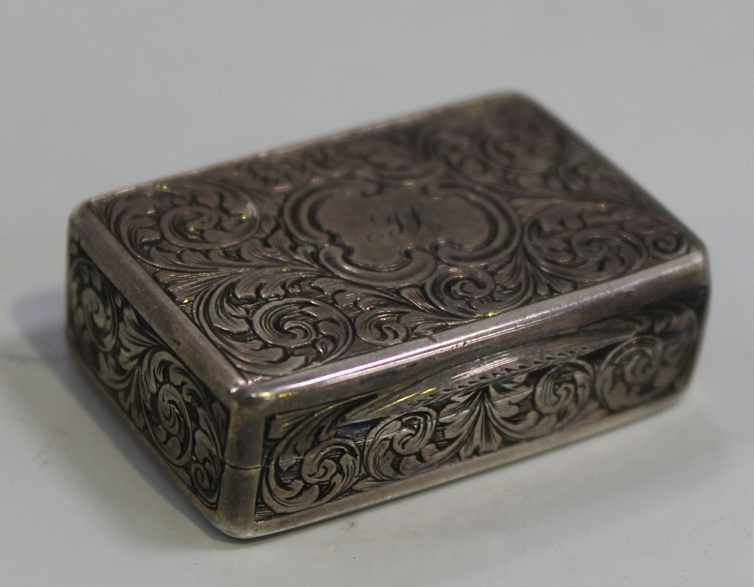 A Victorian silver rectangular snuff box, engraved with all-over scrolling foliage, Birmingham 1848