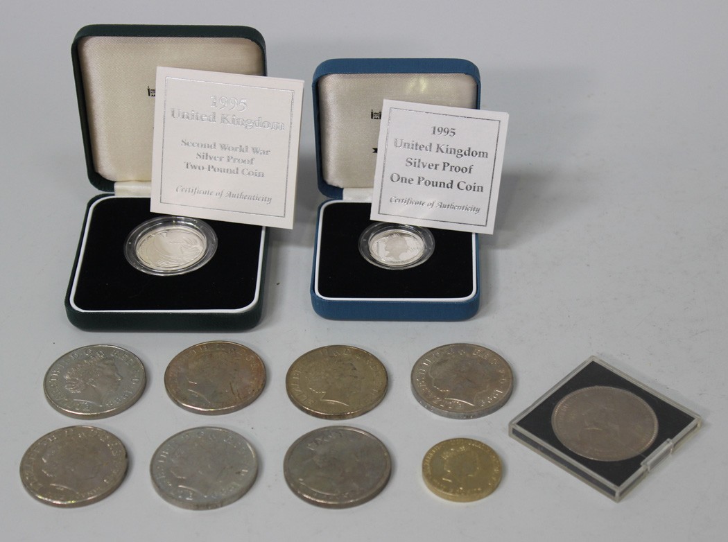 A silver proof two pounds coin 1985, cased, a silver proof one pound coin 1995, cased, a crown 1953,