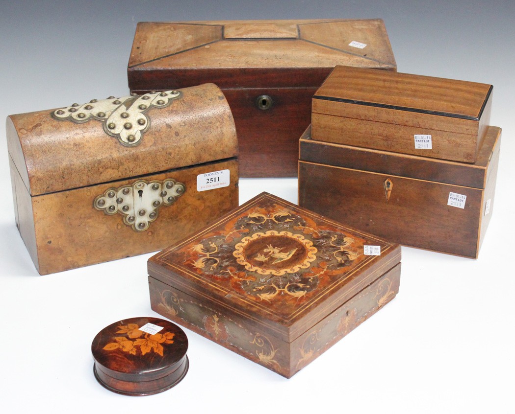 A Victorian burr walnut stationery box with a domed lid, two 19th Century mahogany tea caddies, an