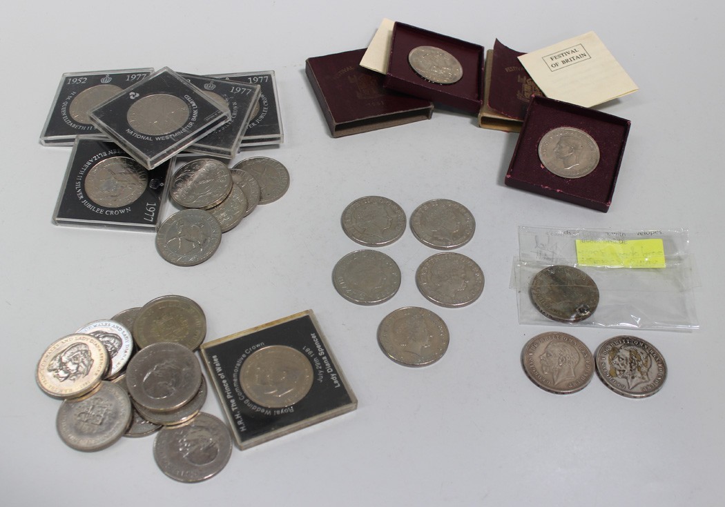 A collection of British crowns, comprising two George V crowns 1935, two George VI Festival of