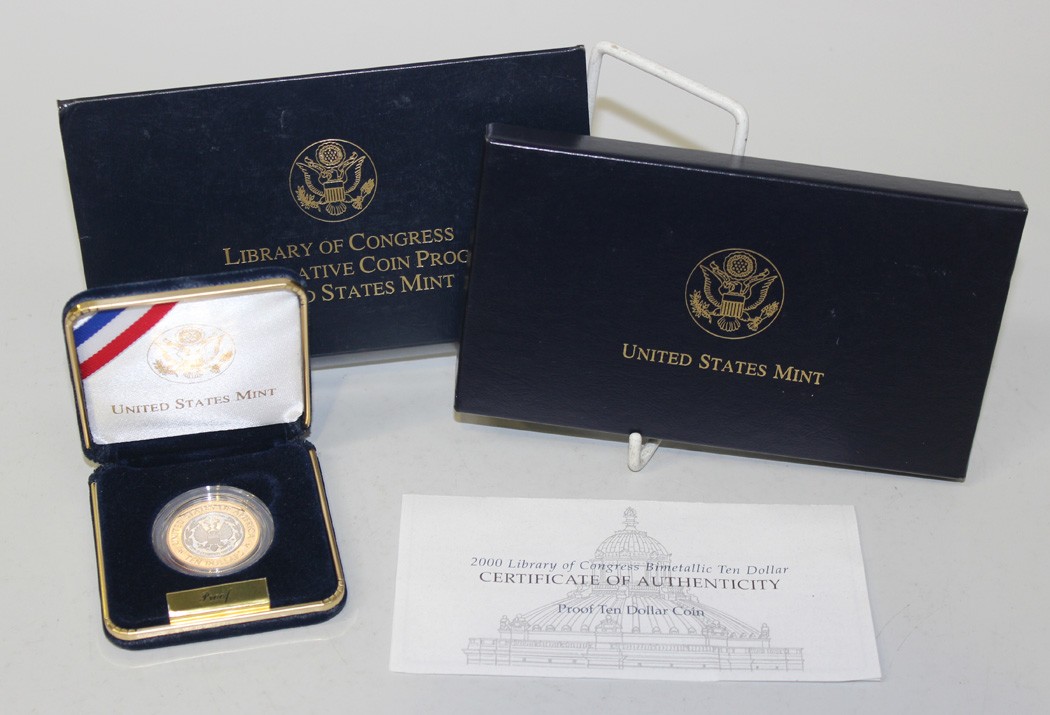 A USA proof ten dollar platinum, gold and alloy coin commemorating the 2000 Library of Congress,