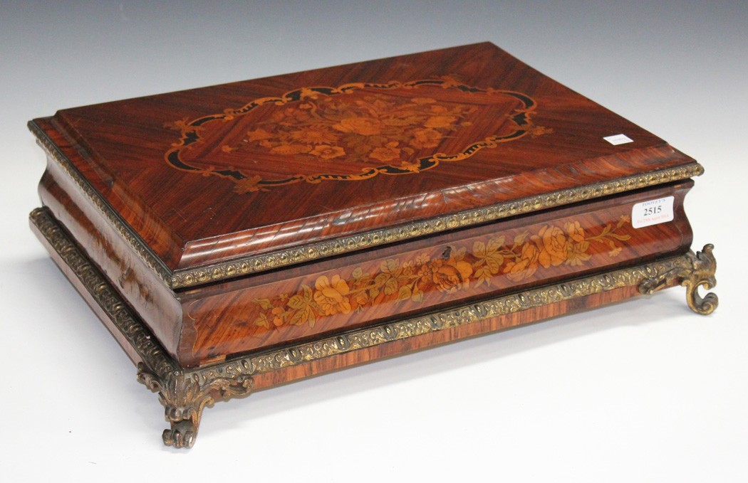 A mid-19th Century French kingwood and floral marquetry box with gilt metal mounted borders, the