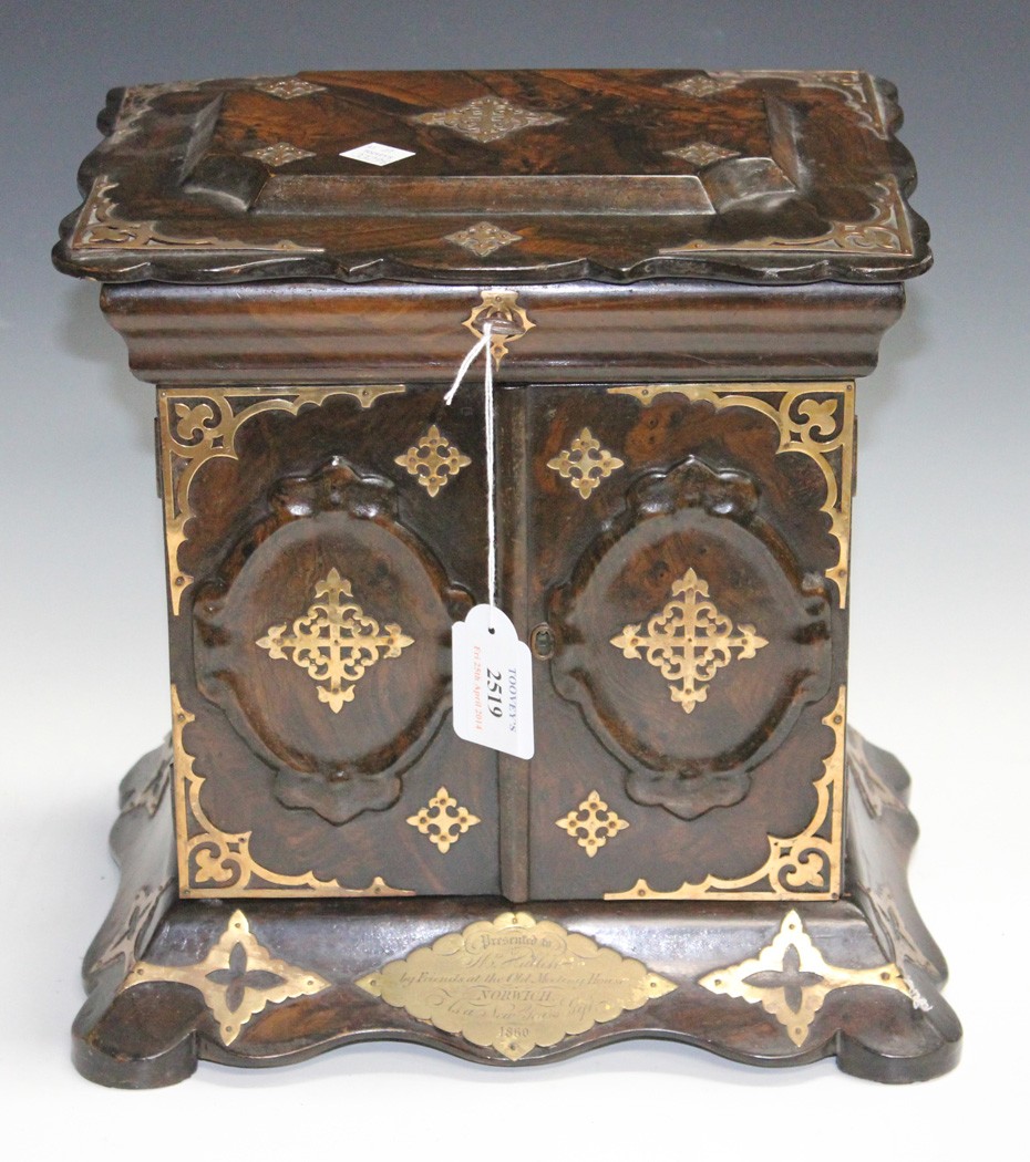 An early Victorian Gothic Revival simulated walnut papier-mâché table top sewing cabinet with