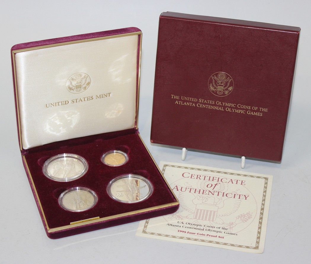 A USA four coin proof set commemorating The Atlanta Centennial Olympic Games 1995, comprising gold