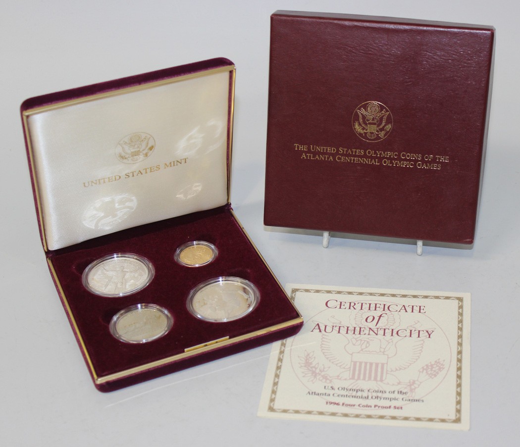 A USA four coin proof set commemorating The Atlanta Centennial Olympic Games 1996, comprising gold
