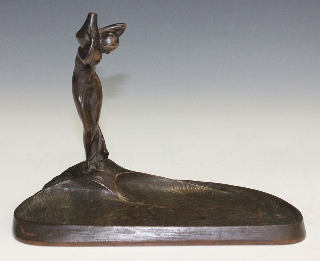 Arthur Rubenstein - a Jugendstil brown patinated cast bronze desk stand in the form of a maiden