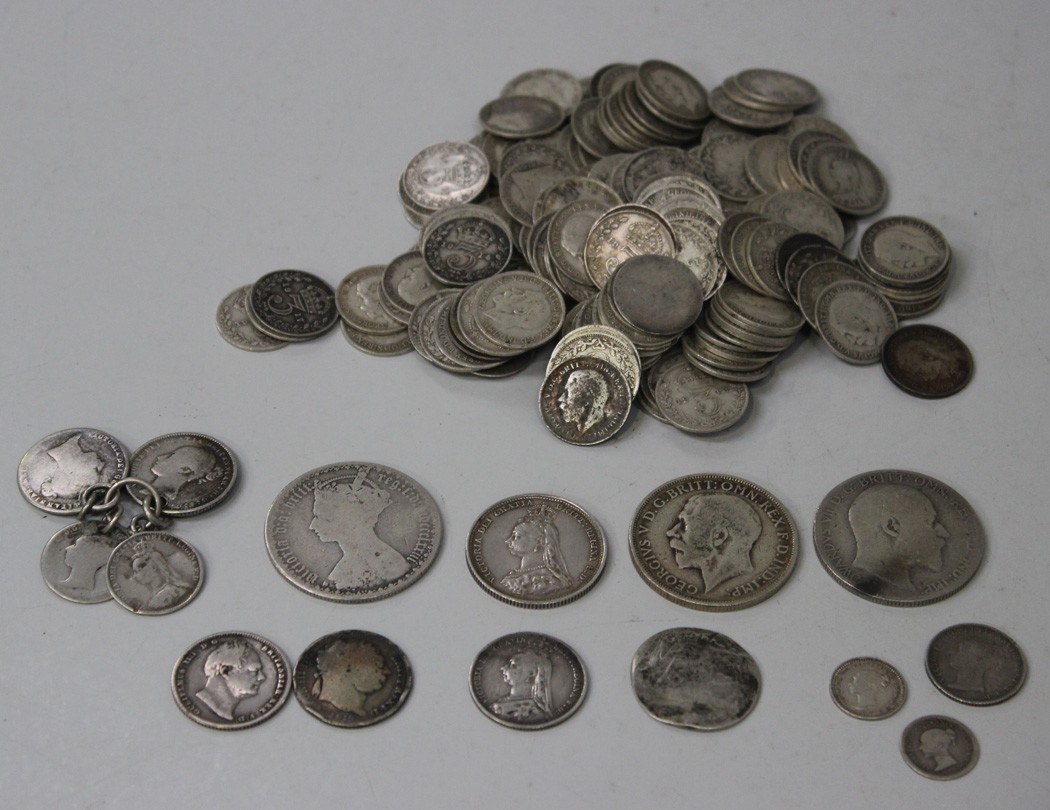 A collection of British pre-1920 coinage, including three florins, a Victoria Jubilee Head