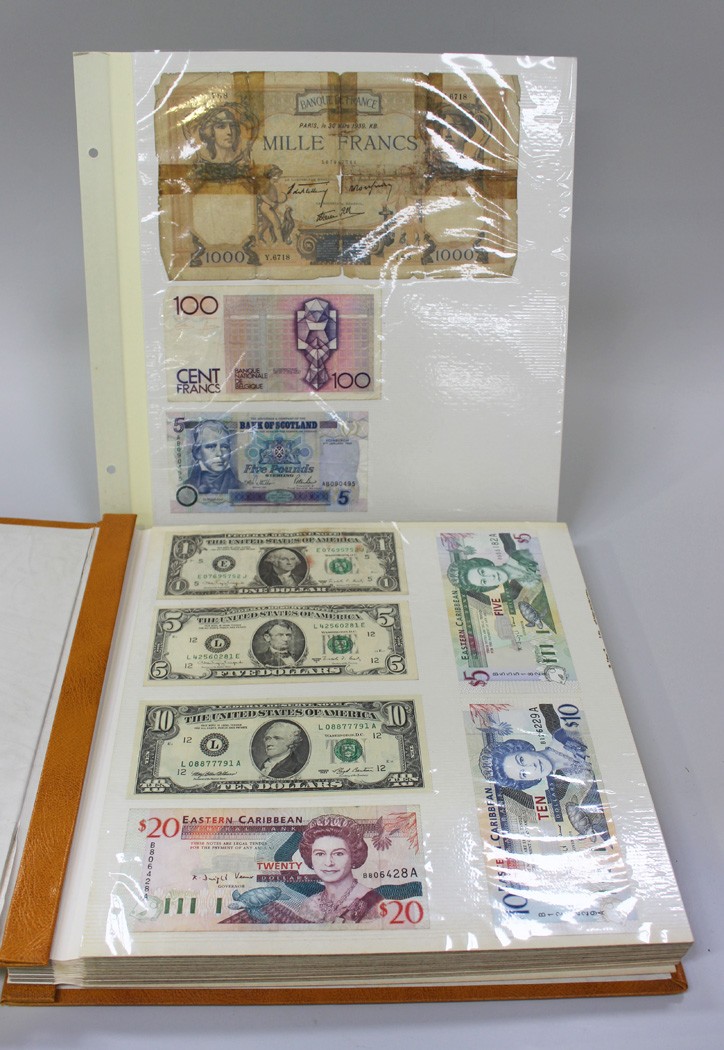 A collection of British and world banknotes, including Royal Bank of Scotland twenty pounds, Eastern